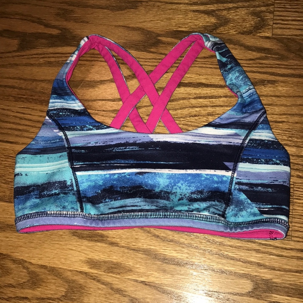Reversible blue and pink Ivivva bra.